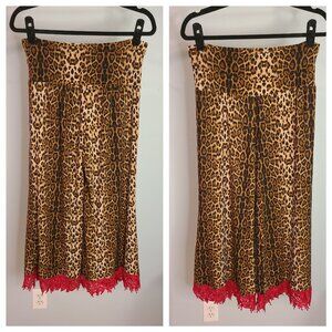 Crazy Train leopard and red lace pants.